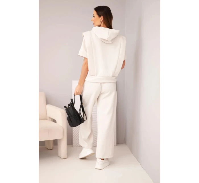 Dámská máslová souprava mikina s kapucí a volné kalhoty se šňůrkou béžový