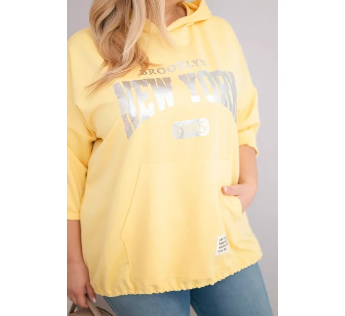 Dámská mikina Plus Size z viskózy s kapucí a klokaní kapsou žlutá Dámská mikina Plus Size z viskózy s kapucí a klokaní kapsou žlutá