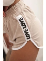 Dámské bavlněné šortky s elastickým pasem a model 21772744 lemem béžové - K-Fashion Dámské bavlněné šortky s elastickým pasem a model 21772744 lemem béžové - K-Fashion