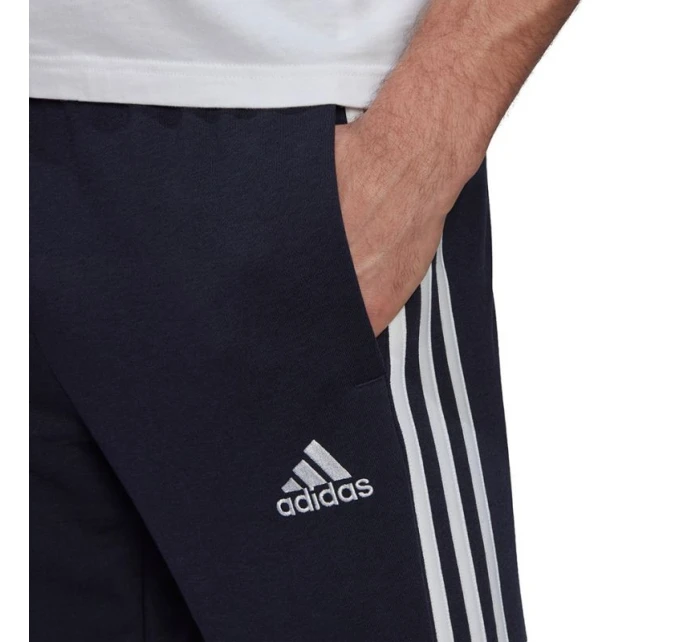Adidas Essentials Elastické nohavice so zúženými manžetami a 3 prúžkami M GK8830