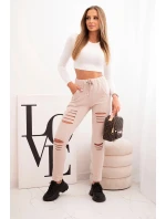 Dámské kalhoty z bavlny s model 21768710 a gumou v pase béžové - K-Fashion Dámské kalhoty z bavlny s model 21768710 a gumou v pase béžové - K-Fashion