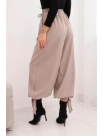 Dámske nohavice so širokými nohavicami a spodným viazaním fango Dámske nohavice so širokými nohavicami a spodným viazaním fango