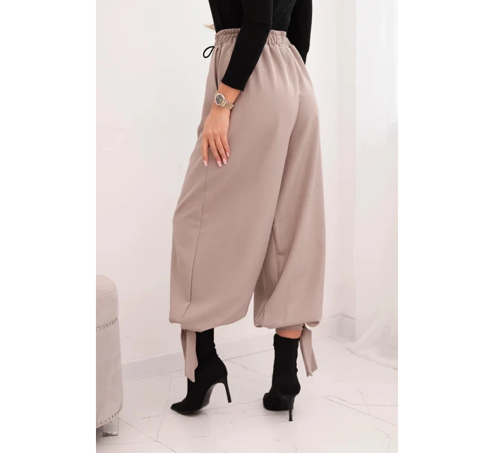 Dámske nohavice so širokými nohavicami a spodným viazaním fango Dámske nohavice so širokými nohavicami a spodným viazaním fango