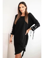 Dámske asymetrické šaty s ozdobnými pásmi a 3/4 rukávmi modrej farby Dámske asymetrické šaty s ozdobnými pásmi a 3/4 rukávmi modrej farby