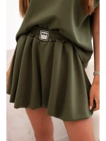 Dámska maslová súprava s blúzkou bez rukávov a šortkami so širokými nohavicami svetlej khaki farby