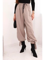 Dámske nohavice so širokými nohavicami a spodným viazaním fango Dámske nohavice so širokými nohavicami a spodným viazaním fango