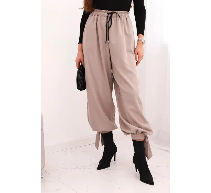 Dámske nohavice so širokými nohavicami a spodným viazaním fango Dámske nohavice so širokými nohavicami a spodným viazaním fango