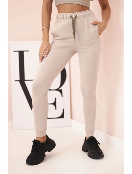 Dámské bavlněné cargo kalhoty s kapsami a řetízkem béžové