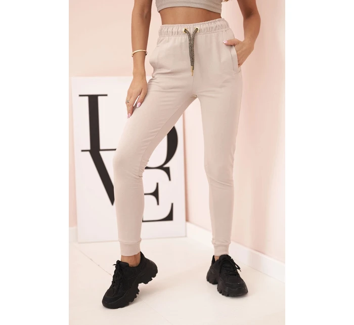 Dámské bavlněné cargo kalhoty s kapsami a řetízkem béžové