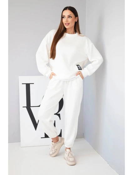 Dámský komplet s model 21808641 volnou mikinou a tepláky ecru - K-Fashion Dámský komplet s model 21808641 volnou mikinou a tepláky ecru - K-Fashion