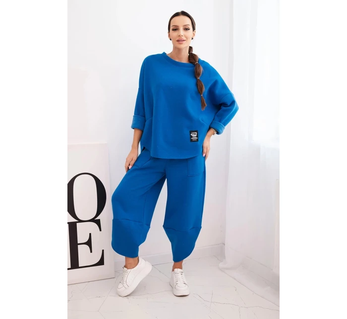 Dámska súprava zo silnejšieho materiálu so širokými nohavicami