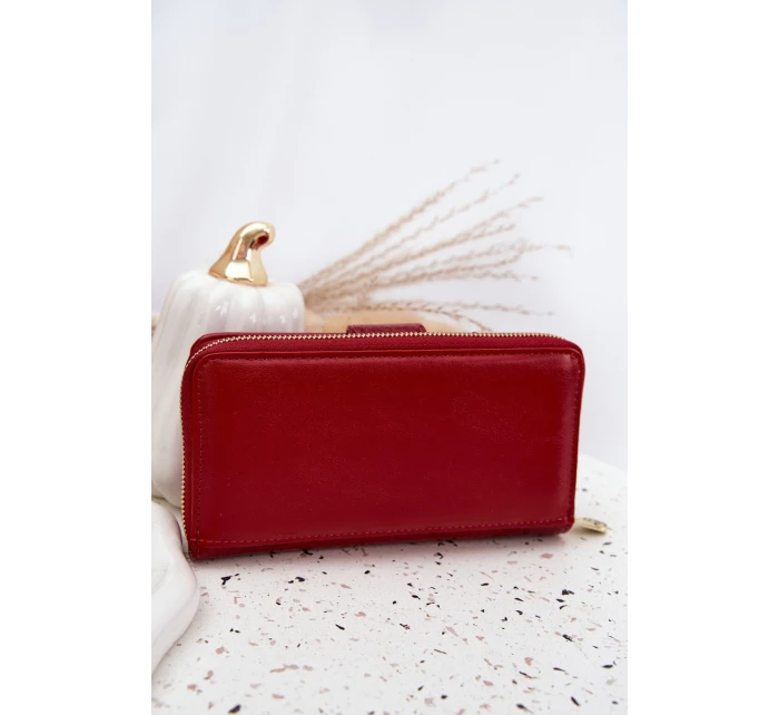 Lakovaná dámska peňaženka s reliéfom a zlatými detailmi Evlinne - červená