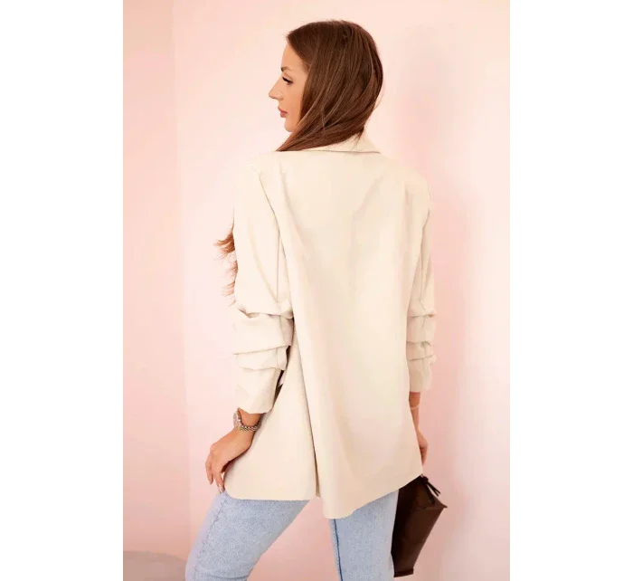 Bunda s klopami elegantná béžová